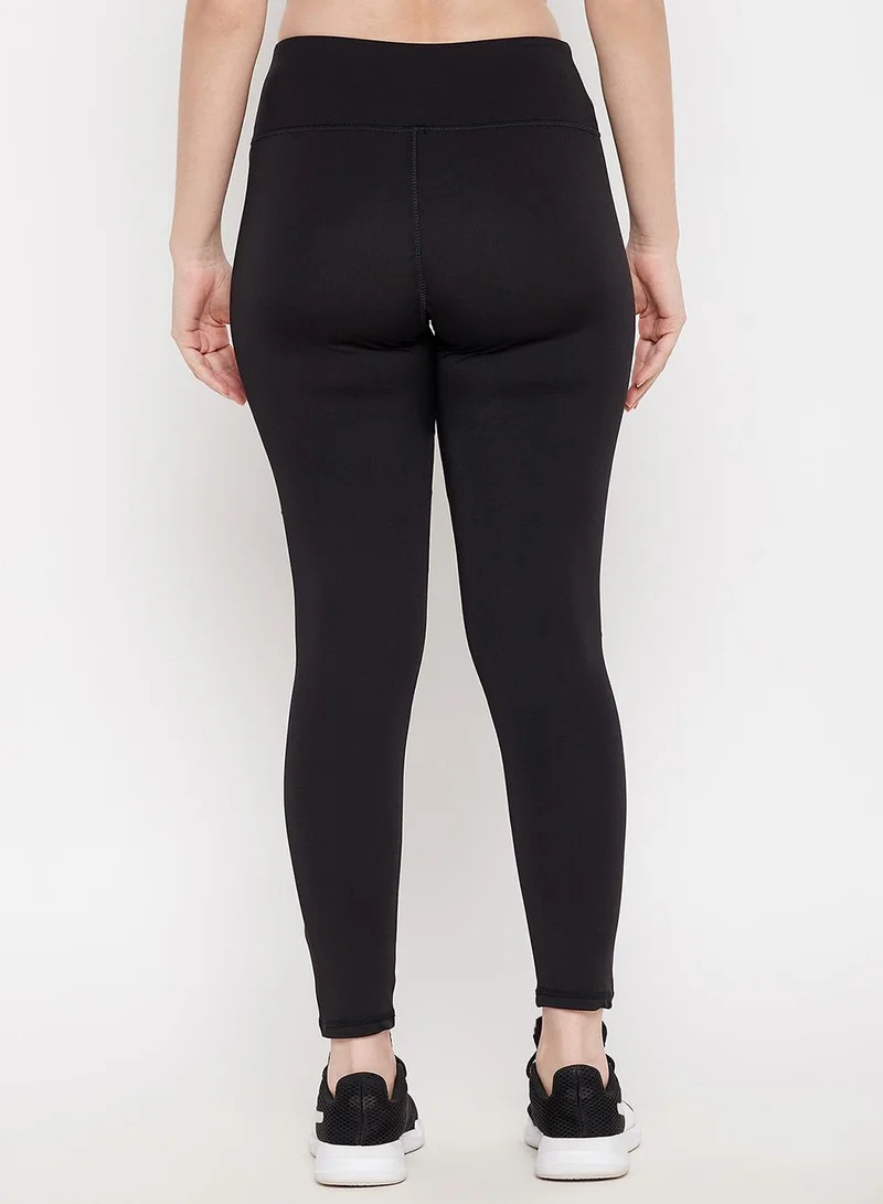 Clovia Black Snug Fit High-Rise Active Tights in Black for Women | Best Price UAE